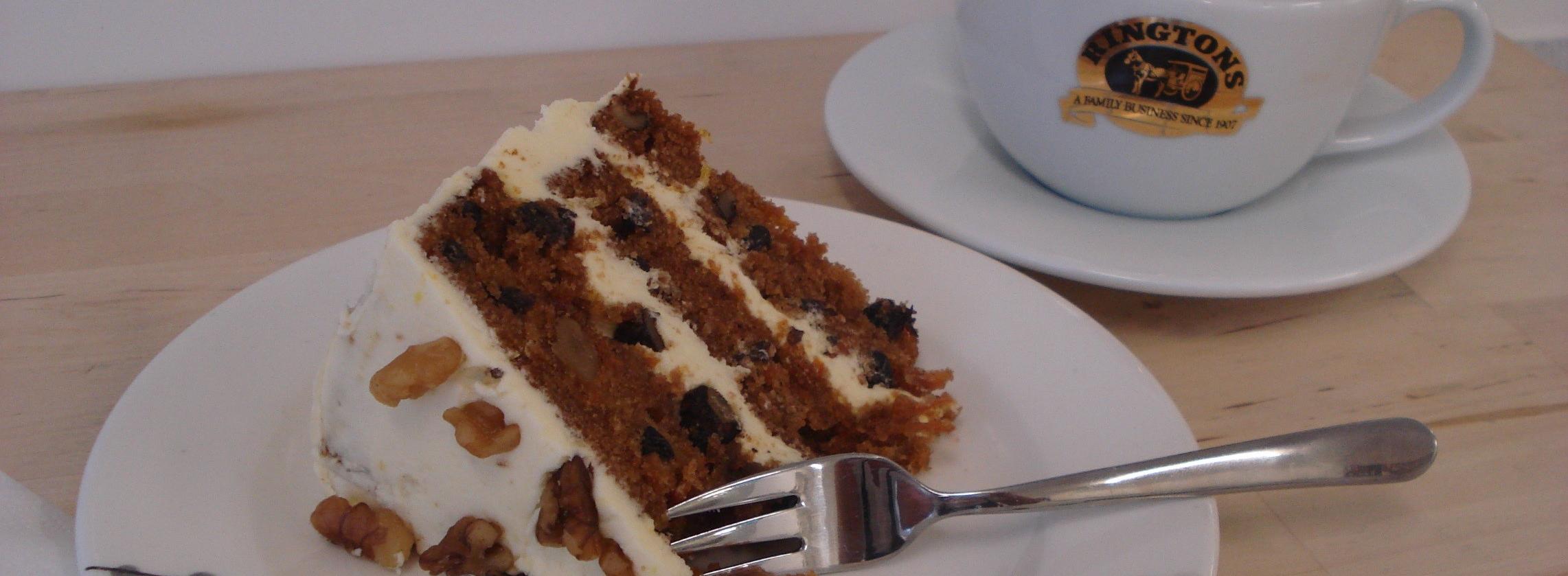 Photo of carrot cake and coffee 